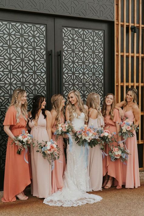 These bridesmaids looked stunning in mismatched pink and coral dresses at this desert wedding | Image by Kayla Fisher Photography Pink Bridesmaid Dresses Mismatched, Peach Wedding Theme, Mix Match Bridesmaids, Women Standing, Peach Bridesmaid, Peach Bridesmaid Dresses, Coral Bridesmaid, Coral Bridesmaid Dresses, Mismatched Bridesmaids