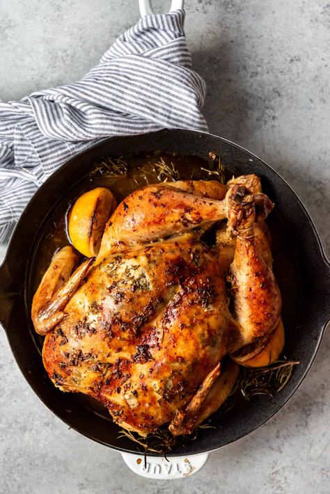 Slow Roasted Chicken slathered in garlic butter is a must for special occasions like Easter! This easy whole roast chicken recipe is absolutely fail-proof with my step-by-step instructions, and ready in 1-2 hours, depending on the size of your chicken. The whole family will love this juicy, tender roasted whole chicken recipe! #best #chicken #roasted #roast #whole #easy #lemon #garlic Slow Roasted Chicken, Baked Whole Chicken Recipes, Best Roast Chicken Recipe, Whole Roast Chicken Recipe, Roasted Whole Chicken, Whole Roast Chicken, Whole Chicken Recipe, Whole Baked Chicken, Best Roasted Chicken