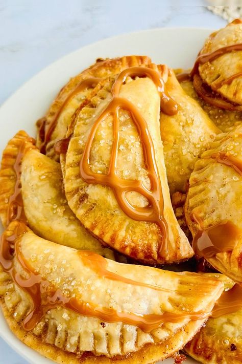 Southern Peach Hand Pies, easy peach hand pies recipe, peach dessert recipes, homemade hand pies, summer peach desserts, peach pie with premade crust, best hand pie recipes, southern dessert ideas, quick peach hand pies, individual peach pies, simple peach hand pie recipe, how to make hand pies, peach hand pies with frozen peaches, mini peach pies Peach Hand Pies, Premade Pie Crust, Southern Desserts, Hand Pie, Hand Pies, Southern Hospitality, Eat Dessert First, Eat Dessert, Sweet Treat