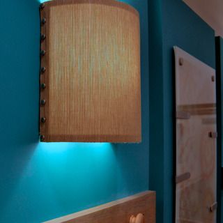 Great DIY wall sconce for those unsightly light bulbs that just stick out of the wall. Of course with different paper. Creating An Entryway, Creative Lamp Shades, Wall Lamp Shades, Wood Lamp Shade, Antique Lamp Shades, Make A Lamp, Rustic Lamp Shades, Wall Scones, Diy Shades