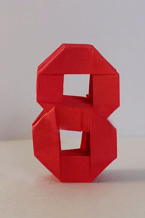 How to make funny and useful origami numbers? i will show you the tutorial of making 3d origami number 8. You can use it for decoration, for anniversary. Origami Numbers, Decoration For Anniversary, Diy Numbers, 3d Numbers, Origami 3d, Useful Origami, 3d Origami, Number 8, I Will Show You