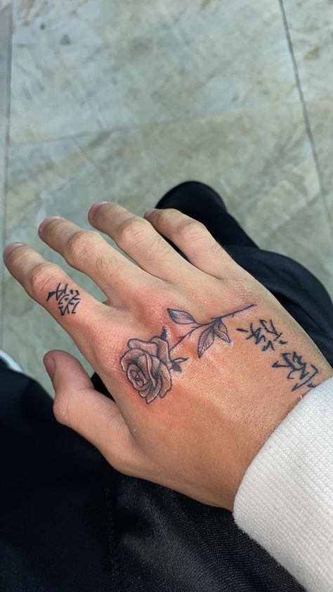 Tiny Flower Hand Tattoo, Tattoo Ideas Hand Man, Rose Tattoo In Hand, Arabic Hand Tattoo, Neck Tattoo For Guys Japanese, Japanese Hand Tattoos For Guys, Simple Hand Tattoos For Guys, Small Rose Hand Tattoo, Man Hand Tattoo