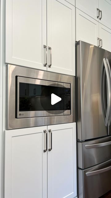 114K views · 2.6K likes | Ryan Walker on Instagram: "Would YOU buy this to save 💰  Instead of buying a built-in microwave that can cost at least $1,000- I bought a regular countertop microwave that had a trim kit available to make it look just like a built in!   It did take a little finesse to install, but once in I think it does a pretty good job 👊  Exact trim kit linked in bio!   What do you think?   #microwave #microwaves #kitchenappliances #kitchenappliance #kitchenideas #savemoney #kitchenmusthaves #kitchenupgrade" Diy Built In Microwave Cabinet, Microwave By Refrigerator, Adding Microwave To Cabinet, Drop Down Door Microwave, Built In Microwave Next To Fridge, Microwave Beside Fridge, Places To Put A Microwave In A Kitchen, Microwave Placement In Kitchen Ideas Upper Cabinets, Microwave Trim Kit Diy