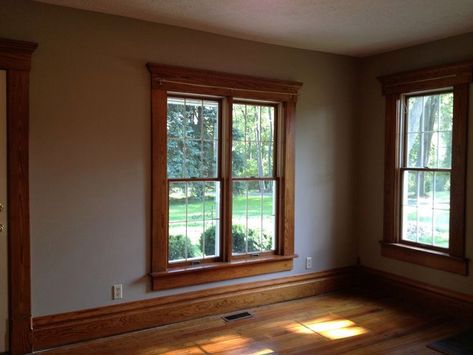 The Stained Wood Trim Stays – 16 Wall Colors To Make It Sing Kitchen Paint Schemes, Honey Oak Trim, Painting Wood Trim, Stained Wood Trim, Small Basement Remodeling, Dark Wood Trim, Best Wall Colors, Neutral Wall Colors, Small Basement Remodel