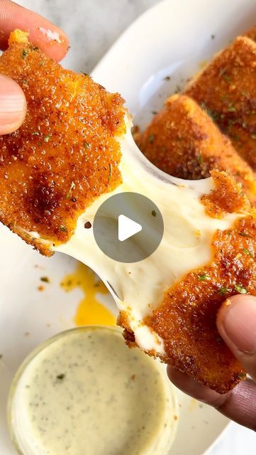 Rey | kingcooks on Instagram: "Nashville Hot Mozzarella Sticks | kingcooks 

🧀🔥Just say “NASHVILLE” and you’ll add this recipe to your amazing collection 🔥🧀

These Nashville hot mozzarella sticks bring the heat with every ooey-gooey bite. Crispy, fiery, and oh-so-cheesy, they’re perfectly paired with a cool, homemade ranch dressing that takes the edge off just right. Ready to savor some spice? 🌶️🧀 #insta #nashvillehot #mozzarella #feastonthese #justlikethat 

Best hot sauce?" Nashville Hot Fried Mozzarella, Chili's Mozzarella Sticks, Nashville Hot Mozzarella Sticks, Fried Appetizers, Cheese Boutique, Chip Dips, Cheese Sticks Recipe, Dips Appetizers, Hand Held Food