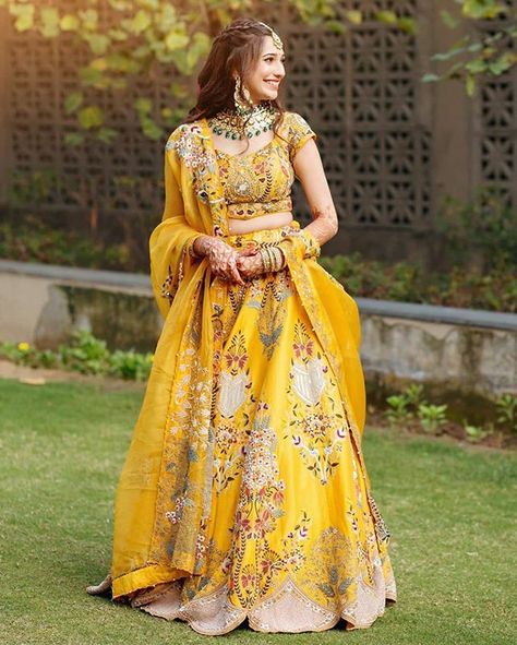 Make Your Haldi Ceremony A True Intimate By These Designer Chic Haldi Outfits! Haldi Ceremony Outfit, Haldi Dress, Designer Bridal Lehenga Choli, Haldi Outfits, Haldi Outfit, Indian Lehenga Choli, Yellow Lehenga, Designer Bridal Lehenga, Bridal Lehengas