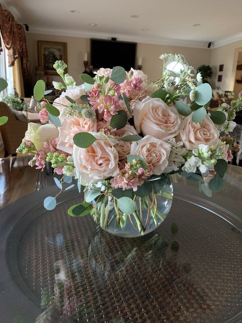 Bubble bowl full of peach and white stock and garden roses. Peach Rose Arrangements, Garden Rose Flower Arrangements, Flower Arrangements Elegant, White Pink Peach Flower Arrangement, Simple Pink Floral Arrangements, Birthday Floral Arrangements Bouquets, 60th Birthday Flowers Arrangements, Flower Bouquet Table Decoration, Rose And Carnation Arrangements