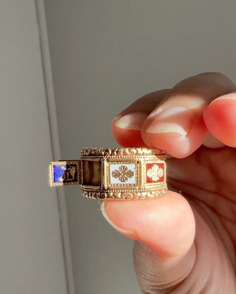 Mouse on Instagram: "RARE Georgian era (early 1800s period) wide band ring newly listed on the website. Here it is in action - amazing fabrication with the hinged panels in multi colored enamel opening to reveal gothic font letters on the inside. Special piece! 🐭 . . . . . . . . . #ringoftheday #jewelryaddict #jewelryobsessed #victorianrings #georgianrings #signetring #antiquering #poisonring #mourningring #mourningjewelry #locketring #locket #enamelring #antiqueenamel #museumjewelry #specialring #jewelsofdistinction #enameljewelry #floralring #ooak #ooakjewelry #ooakring #oneofakindjewelry #rarering #stackablerings #stackablebands #heavygold #wideband #georgianring #georgianjewelry" Thrifted Rings, 1800 Jewelry, Ring Locket, Vintage Ruby Ring, Georgian Ring, Ruby Ring Vintage, Dope Jewelry Accessories, Font Letters, Gothic Font