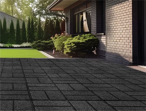 Elevate your outdoor space with GroundSmart SmartLoc Rubber Pavers. Made from 100% recycled rubber, these pavers are not only sustainable but also durable and long-lasting. With SmartLoc connecting system, installation is quick and secure, allowing you to create a beautiful new patio or deck. Plus, these pavers won't freeze or crack, making them the perfect choice for any DIY enthusiast looking for a low-maintenance option. Rubberific 16-in L x 16-in W x 0.625-in H Square Black Smartloc Rubber Paver Multi-pack | DCPV16ILBK9 Patio Ground Ideas, Recycled Rubber Pavers, Easy Backyard Ideas On A Budget, Patio Pavers, Cheap Walkway Ideas Diy, Rubber Walkway, Mulch Alternatives, Outdoor Rubber Flooring, Rubber Paver