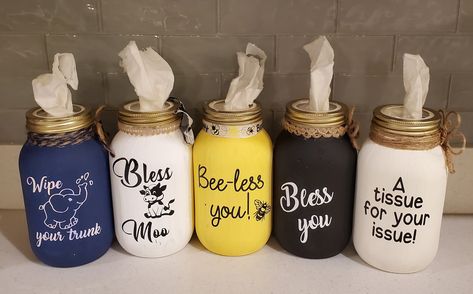 Customize a hand painted Mason Jar to add to any room in your house. This jar also makes a wonderful gift for friends, family, teachers, neighbors, boss, etc.  The jar is hand painted with vinyl design of your choice. One set of 50 tissues is included and already installed in the jar. Jar style (regular or wide mouth) may vary depending on availability. Jute Cord, ribbon, or flower decor may vary depending on availability of product, style of design, and handmade variations. Please send a message if you have any questions or specific requests. Care: Wipe with a clean, dry cloth. Do not soak, scrub, use abrasives, or submerge in liquid.  Size: Approximately 3.75 inch Diameter x 7 inch tall (32oz Mason Jar) Returns: We do not accept returns, but please contact us with any issues right away! Painting Mason Jars Diy, Mason Jar Gifts Diy, Mason Jar Holder, Crafts With Glass Jars, Jar Centerpieces, Jar Art, Mason Jar Crafts Diy, Mason Jar Gifts, Painted Mason Jars