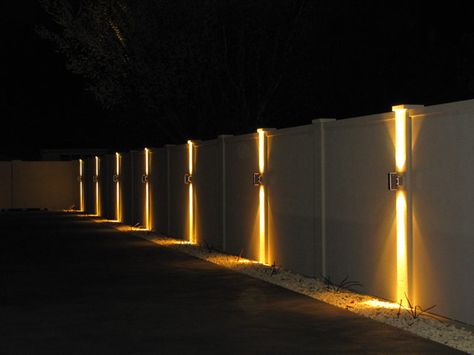 Is It Possible To Light Up Your Fence? - Straight Line Fence Outside Lights On Fence, Fence Wall Lighting Ideas, Lights For Fence Posts, Lights On Side Of House, Modern Fence Lighting, Fence With Lighting, Light On Wall Ideas, Fencing Lighting Ideas, Fence Lights Ideas