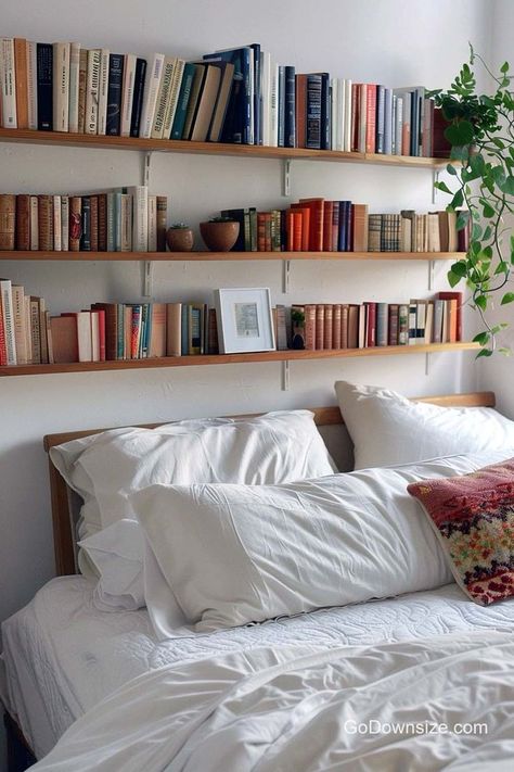 Headboards occupy a ton of space, so we better find ways to maximize this area of our bedroom. Book Storage Aesthetic Bedroom, Bed Side Book Shelf Ideas, Book Display Ideas Home Bedroom, Books Over Bed, Floating Bookshelves Above Bed, Bed Frame Bookshelf, Book Shelves Above Bed, Books Above Bed, Bookshelves Over Bed