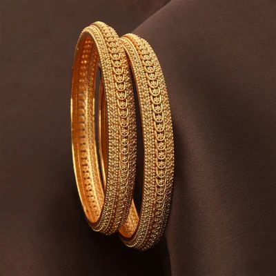 Buy Imitation and Artificial Jewellery Bangles Online for Women – Violet & Purple Designer Fashion Jewellery Kade Designs Gold, Gold Kade Designs For Women, New Bangles Design In Gold, Gadwali Jwellery, Simple Bangle Designs Gold, Gold Kada For Women, Modern Gold Bangles, Gold Bangles Design Modern, Bangles Gold Design