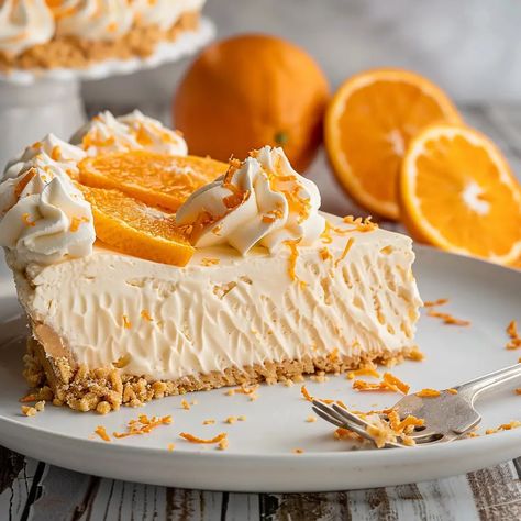 No-Bake Orange Creamsicle Cheesecake Creamsicle Cheesecake Recipe, Orange Creamsicle Cheesecake Recipe, Orange Creamsicle Cheesecake, Orange Cheesecake Recipes, Creamsicle Cheesecake, Cheesecake With Whipped Cream, Mini Cheesecake Bites, Frozen Cheesecake, Swirl Cheesecake