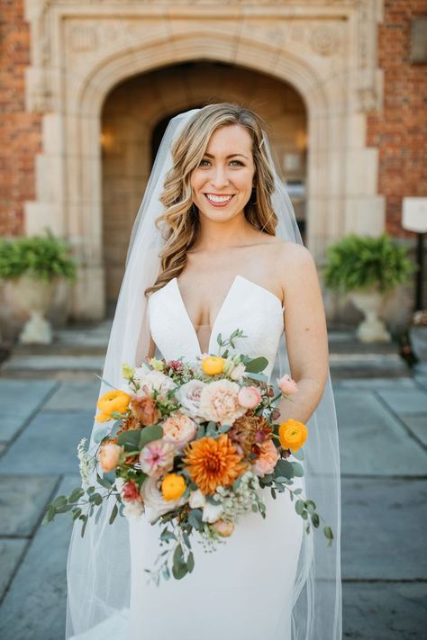 Weddings By Vogue Floral Design. Vogue Flowers Richmond, Virginia wedding florist. Textura bouquet. Juliet Garden Rose, Burnt Orange Disbud Dahlia, Quickstand Rose, Peach Lisianthus, Blush Majolica Spray Rose, Apricot Ranunculus, Dusty Rose Carnation, White Orlaya, Yellow Ranunculus. The Branch Museum and Hardywood Brewery. Amelia Blaire Photography. #weddingsbyvogue #vogueflowers #virginiawedding #virginiaweddingflorist #richmondwedding #autumnbouquet #bridalbouquet #orangeflorals Dusty Rose And Yellow Wedding, Carnation Wedding, Ranunculus Wedding, Yellow Carnations, Burnt Orange Weddings, Orange Wedding Flowers, Blush Bouquet, Yellow Wedding Flowers, Pink Rose Bouquet