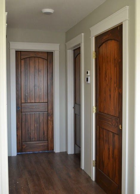 Wood doors, white trim. Stained Interior Doors, Interior Doors Stained, Wood Doors White Trim, Replacing Interior Doors, Farmhouse Interior Doors, Mountain Craftsman, Stained Trim, Black Interior Doors, Stained Doors