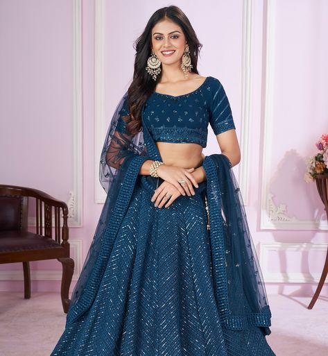 Designer navy blue thread embroidery work wedding lehenga choli with Georgette blouse and soft net dupatta 💙✨ SHOP NOW 🛍️ gotifab.com [blue lehengas,Indian wedding dresses , Indian lehengas , wedding lehenga choli for women, wedding lehengas ,blue choli ] #weddingdresses #indiantraditionalwear #navratrichaniyacholi #bluelehenga #chaniyacholi #gotifablehenga Sequins Lehenga Choli, Teal Blue Blouse, Sequins Lehenga, Lehenga Choli Latest, Reception Gowns, Lehenga Choli Designs, Ghaghra Choli, Lehenga Choli For Women, Bridesmaid Lehenga