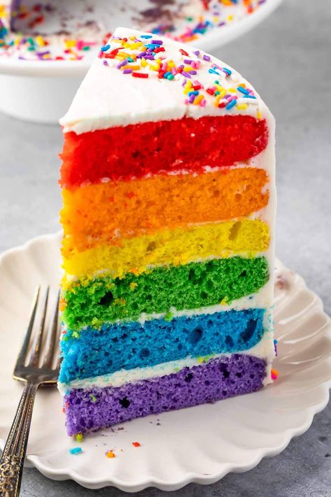 The perfect Rainbow Cake recipe starts with a cake mix and has homemade frosting. No one will know this cake is semi-homemade and it's the perfect rainbow colors for any rainbow party! Zoe Cake, Rainbow Cake Recipe, Rainbow Layer Cakes, Rainbow Birthday Cake, 4th Birthday Cakes, Homemade Frosting, Semi Homemade, Rainbow Food, White Cake Mixes