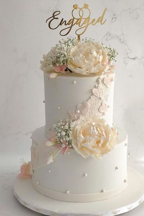 Classic 2 tier engagement cakes with ivory sugar florals and detailing ✨ Kek Kahwin 2 Tingkat, Engagement Cakes Simple, Engagement Cake Designs Simple, Two Tier White Cake, Engagement Theme Cake, Engagement Cake Designs Unique, Engagement Cake Images, Wedding Cake Designs Simple, Cake Themes