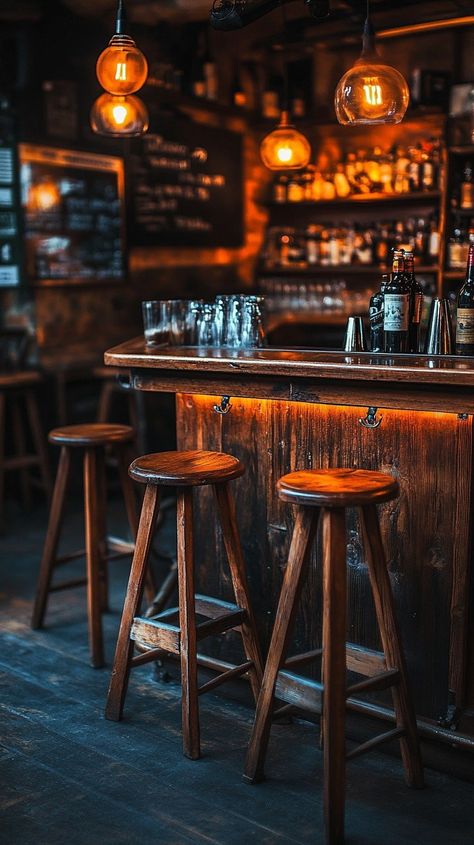 "Cozy #barinterior: A warmly lit bar features wooden stools, a #rusticdesign counter, and hanging pendant lights above. #barscene #wooddecor #designideas #homedecor #decorinspiration #aiart #aiphoto #stockcake ⬇️ Download and 📝 Prompt 👉 https://stockcake.com/i/cozy-bar-interior_1341710_578384" Bar Foods Pub, Pub Aesthetic, Scandinavian Bar, Brand Deck, Terceira Azores, Future Restaurant, Ski Bar, Cabin Bar, Bar Aesthetic