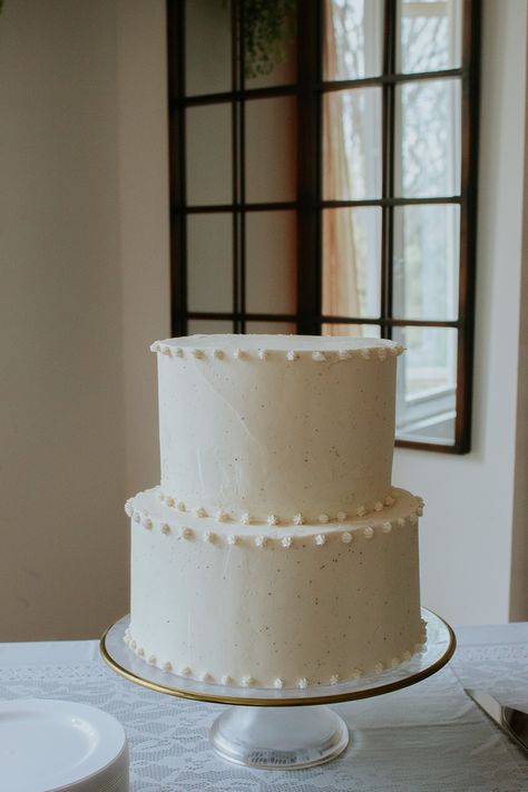 Wedding inspo, weddings, chic wedding, ideas, elegant wedding, white cake, pretty, small wedding cake, traditional cake, modern wedding, wedding decor, green and white Small Traditional Wedding Cakes, Simple Wedding Cake Small Two Tier, Plane White Wedding Cake, Two Tiered Simple Wedding Cake, Basic Wedding Cake Simple, Minimal Icing Wedding Cake, Simple Cakes Wedding, Wedding Cake Ideas Elegant Simple, Wedding Cakes Two Tier Elegant