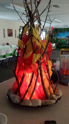 Indoor Campfire Ideas, Diy Campfire, Vbs 2024 Camp Firelight Crafts, How To Make A Burning Bush Prop, Fake Campfire Diy How To Make, Campfire Light Vbs Decor, Camp Firelight Vbs Crafts, Play Campfire Diy, Vbs 2024 Camp Firelight