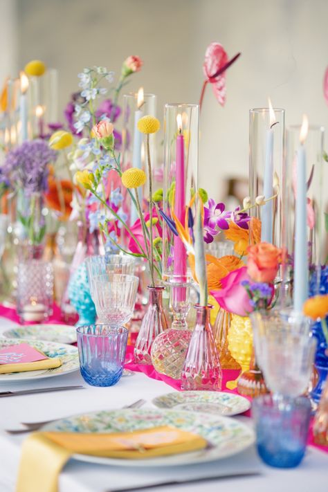 Colorful Rainbow Palette Wedding Reception #WeddingChicks #colorfulwedding #tuscansamesexwedding #tuscanwedding #lgbtq #lgbtqwedding Lesbian Wedding Table Decorations, Colored Glasses Wedding, Wedding Flower Table Arrangements, Bright Tablescape, 2026 Wedding, Wildflower Wedding Theme, Wedding Dresses Guest, Elegant Wedding Dresses, Rainbow Palette