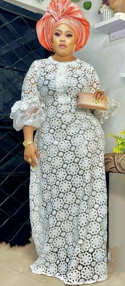 Pin by Tale Aro on Quick saves in 2022 | African lace styles, Lace dress styles, White lace outfit Nigerian White Lace Long Gown Styles, African Lace Dresses Nigerian Fashion Classy, Simple Lace Gown Styles, White Lace Gown Styles Nigerian, Simple Lace Styles, White Lace Dress Styles Nigerian, Latest Cord Lace Gown Styles, Cord Lace Gown Styles, Lace Dress Styles Nigerian