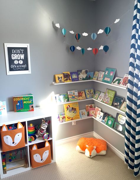 Nursery Shelf Decoration Ideas Living Room, Infant Room Ideas At Home, Toddler Room Organization Boy, Book Placement Ideas, Nursery For Two Under Two, Boy Playroom Ideas Toddler, Toddler Boy Small Bedroom Ideas, Nursery Library Ideas, Toddler Boy Montessori Bedroom