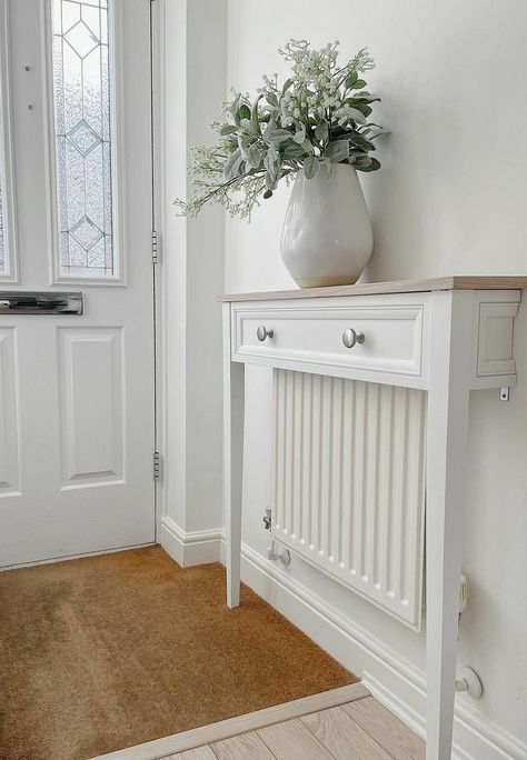 Easy way to transform your living space Radiator Shelf Decor, Small Entryway With Radiator, Window With Radiator Underneath, Radiator Cover With Shelves, Radiator Cover Table, Hiding Radiator Ideas, Cover For Radiator Ideas, Radiator Cover Hallway, Radiator Shelf Hallway