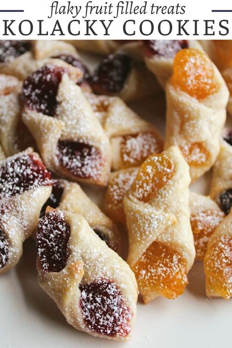 It wouldn’t be Christmas without some homemade kolacky cookies. The tender, flaky pasty is wrapped around fruit filling to make a tasty dessert. Whether you enjoy them warm or at room temperature, these pillowy delights are perfect for any occasion! Whip up a batch for your afternoon tea party or surprise your loved ones with a plateful of these irresistible treats to brighten their day. Cookies With Fruit Filling, Pinch Cookies Holidays, Flaky Polish Kolaczki, Cheap Fruit Desserts, Polish Cream Cheese Cookies, Cream Cheese Kolacky Cookies, Kolachy Cookies Easy, Nut Roll Cookies Christmas, Cresent Roll Cookies