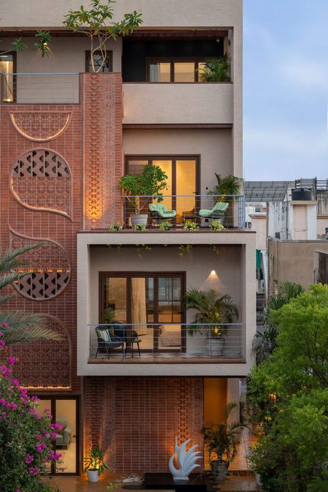 Brick Nest House in Vadodara, India by M|Houses Plant House Exterior, Front Design Of House In India, Bunglow Elevation Modern India, Brick Elevation Design, Brick Cladding Exterior House, Home Outer Design, Brick Facade House, Exposed Brick House, Brick Facade Design