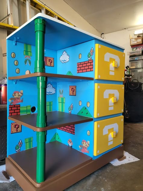 Mario Furniture Diy, Custom Kids Dresser, Super Mario Wall Art, Lego Mario Display Ideas, Super Mario Themed Bedroom, Mario Dresser, Super Mario Room Ideas Boys, Pokemon Dresser, Super Mario Room Ideas