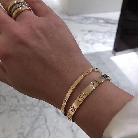 Two Cartier Love Bracelets, Gold Bracelets Stacked, Accesories Jewelry, Luxe Jewelry, Cartier Jewelry, Dope Jewelry, Classy Jewelry, Stacked Jewelry, Valentines Jewelry