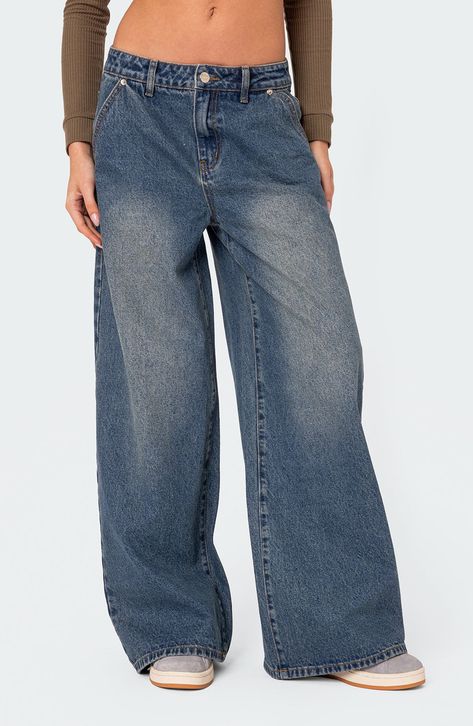 Low-slung, nonstretch jeans are crafted with puddling hems and turned to the perfect faded indigo wash. Zip fly with button closure Five-pocket style 100% cotton Machine wash, dry flat Imported Baggy Wide Leg Jeans, Baggy Clothes, Fits Clothes, Outfit Jeans, Swaggy Outfits, Pantalon Large, Cute Everyday Outfits, Wide Leg Denim, Outfit Casual