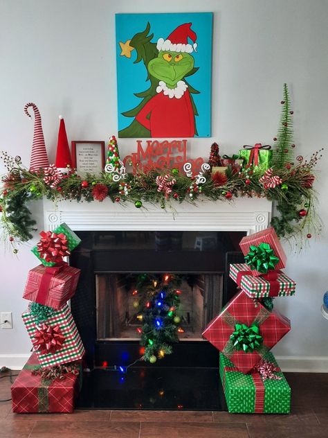 Grinch Theme Christmas Decor Outside, Grinch Party Centerpieces Diy, Grinch Fireplace Garland, Grinch Fireplace Mantle, Grinch Theme House Decorations, The Grinch Theme Christmas Decor, Grinch Mantel Ideas, Whoville Christmas Mantle, Whoville Inspired Christmas Decor