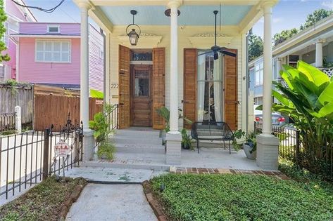 2225 Short St, New Orleans, LA 70118 Shotgun House Interior, Hall Flooring, Shotgun House, New Orleans Homes, Old Houses For Sale, Stock Tank, Cottage Interior, Pine Floors, Building Exterior