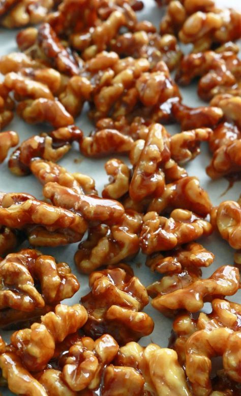 5 minutes, 5 ingredients, one pan caramel walnuts that are chewy, crisp, salty and not-too-sweet!! The simplest of recipes. It’s so easy, its ridiculous.  These are perfect for your cheese board or over ice cream / pancakes / waffles or with popcorn or over crostini or just a snack (the best!!!).   Or wrap them in … Snack Nuts Recipes, Caramel Nuts Recipe, Candied Walnut Recipe, Cream Pancakes, Glazed Pecans, Walnut Recipes, Nut Snacks, Snack Mix Recipes, Candy Recipes Homemade