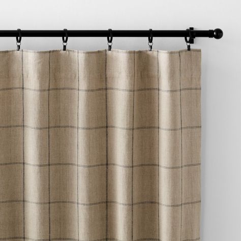 Our curtain panels frame windows with a decor-friendly pattern and the breezy look of natural linen. With a graceful drape, the warm beige curtains showcase windowpane checks composed of double-lined pinstripes in dark grey. A blackout lining blocks unwanted illumination and provides privacy, while putting the focus on the organic beauty of woven linen. Hang our exclusive linen curtains with blackout liners from the back tabs for a pleated look, or use the rod pockets to create a more casual, ga Anthropologie Bedroom Curtains, Patterned Bedroom Curtains, Taupe Linen Curtains, Earthy Bedroom Curtain Ideas, Kitchen Dining Curtains, Plaid Window Treatments, Pattern Drapes For Living Room, Curtains Over Doors, Family Room Drapery Ideas