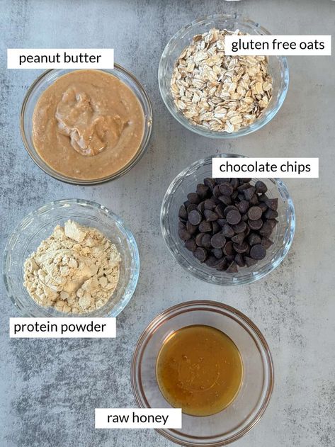 These Peanut Butter Oatmeal Protein Balls are a healthy snack. These no-bake bites are packed with protein, fiber and healthy fats, making them the perfect on-the-go energy boost. Plus, they're bursting with flavor thanks to creamy peanut butter and chocolate chips. With just a few ingredients, you can whip up a batch for a satisfying and customizable anytime snack. #peanutbutteroatmealproteinballs #peanutbutterproteinballs #homemadeproteinballs Protein Oat Bites, Protein Balls Oats, Peanut Butter Oatmeal Protein Bar, Protein Balls Chocolate Chip, Protein Balls No Chocolate Chips, Reese Protein Balls, Healthy Oatmeal Protein Balls, Oatmeal Protein Balls Peanut Butter No Bake Energy Bites, Protein Balls With Honey