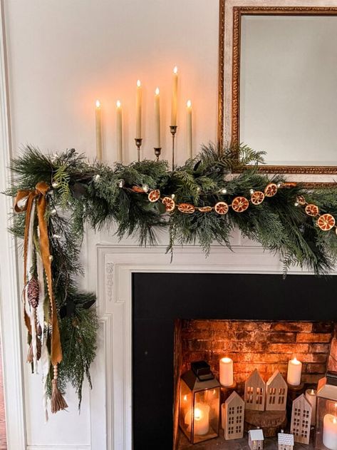 Create a luxe holiday home with these 30 sophisticated Christmas decorating ideas to deck your halls! | Home Made by Carmona #Christmas #decor #holiday #luxe #decorating #holidaydecoratingideas Garage Garland Christmas, Traditional Christmas Decorations Outdoor, Boho Christmas Window Display, Christmas Mantle 2023, Subtle Holiday Decor, Old English Christmas Decor, Luxe Christmas Decor Ideas, Rust Christmas Decor, Mountain Lodge Christmas Decor Ideas