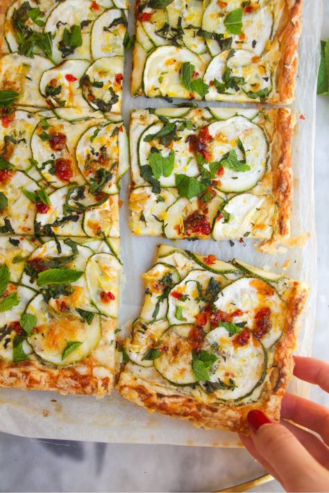 Celebrate zucchini season with this easy, speedy zucchini tart. Just slather a sheet of puff pastry with creamy Boursin cheese, top with sliced zucchini and bake until golden. A drizzle of sweet chilli jam makes it a very special picnic, barbecue or party snack idea. Loaded Bread, Appetizer Wreath, Christmas Sausage, Zucchini Tart, Roll Wreath, Easy Chilli, Bread Dipping Oil, Bread Dipping, Grilled Broccoli