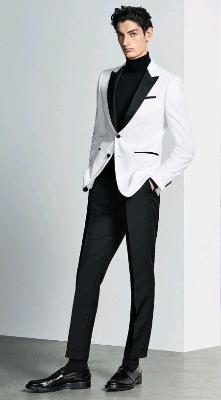 A crisp white suit paired with a black turtleneck defies convention. The sharp contrast between the two pieces brings an avant-garde twist. Ensure the fit is perfect tailored to your frame for maximum effect. Black boots complete this minimalist, powerful statement look.
Top: Crisp white suit jacket with turtleneck underneath.
Bottom: Black trousers and sleek black boots.
#MensStyle #Mensactivewear #Mensbottoms #WinterOutfit #FallFashion #Christmas #Gentleman #ChristmasOutfit #ChristmasDecor Black And White Tuxedo Men, Men Christmas Party Outfit, Black Wedding Dress Wedding, Jacket With Turtleneck, White Coat Ceremony Outfit, Mens Christmas Party Outfit, White Blazer Men, Black White Wedding Dress, Mens White Suit