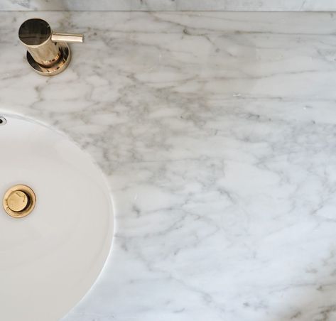 Bathroom Marble Regrets: Why we regret adding marble in 3 of our bathrooms. This is a must-read if you're considering using marble in a bath. Mixing Marble In Bathroom, Bathroom Countertops Marble, Carrera Marble Bathroom Countertop, Marble Counters Bathroom, Carrara Marble Tile Bathroom, Polished Marble Bathroom, Honed Carrara Marble Bathroom, Carrara Marble Bathrooms, Carrara Marble Bathroom Vanity