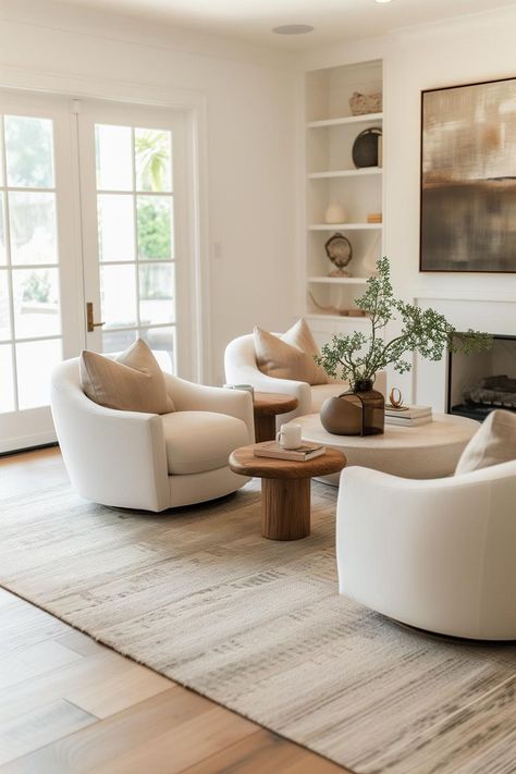 Swivel accent chairs in a neutral modern living room Chairs Only Living Room Ideas, Easy Living Room Ideas, Swivel Accent Chairs, Neutral Living Room Decor, Ideas Decoracion Salon, Contemporary Living Room Chairs, Lounge Room Styling, Sitting Room Chairs, Modern Swivel Chair