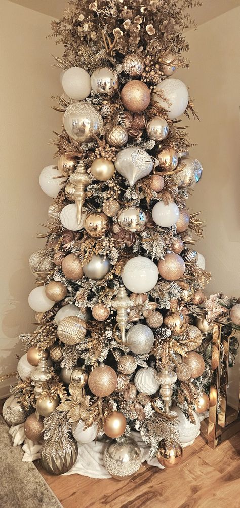 My Christmas Tree for 2023! I used white, gold, silver, champagne, rose gold and pearl ornaments. I also used gold foliage and antlers to give it a rustic touch. #ChristmasTree #GoldDecor #christmasdecor #Christmas #ornaments White And Gold Christmas Tree Topper, Champagne Ornaments Christmas Tree, White Pencil Christmas Tree Ideas, Christmas Tree Champagne Color, Coastal Chateau, Gold And Cream Christmas Tree, White And Champagne Christmas Tree, Cream Christmas Decor, Champagne Christmas Decor