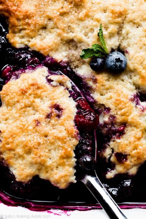 A delicious and easy summer dessert, this mixed berry cobbler combines fresh berries and a buttery biscuit topping. Serve warm or at room temperature with vanilla ice cream. Recipe on sallysbakingaddiction.com Mixed Berry Cobbler, Berry Cobbler Recipes, Sallys Baking, Cheesecake Oreo, Berry Cobbler, Sally's Baking, Fruit Cobbler, Blueberry Cobbler, Buttery Biscuits