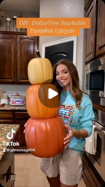 Amanda Jean Gilmore | I love these stackable pumpkins from the DollarTree. I used bakingsoda, paint and some fall greenery for a cheap and simple upcycle. I... | Instagram Dollar Tree Stackable Pumpkins Craft Ideas, Stacking Pumpkins Porch Diy, Painted Stacking Pumpkins, Halloween Stackable Pumpkins, Christmas Decor With Pumpkins, 3 Tier Pumpkin Decoration, Thanksgiving Outdoor Decorations Diy, Easy Diy Outdoor Fall Decor, Fall Decor For Outdoors