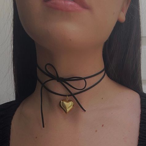 The Keke Suede String Heart Necklace 🤍 *all photos owned by me!* Featuring a stainless steel puffy heart pendant, and a 48" cut suede string cord. There are a ton of ways to wear this necklace (you can even wear it as a waist belt!) and if you need a custom length, DM me!  Choose between gold and silver at checkout  Unisex & tarnish proof 🖤 Made with love 🫶 Necklace Cord, Heart Choker Necklace With Adjustable Chain As Gift, Metal Heart Choker Necklace As Gift, Leather Cord Necklace, Chunky Heart Necklace, String Necklace, Heart-shaped Metal Choker Necklace As Gift, Red Heart Charm Choker Necklace, Black Cord Necklace