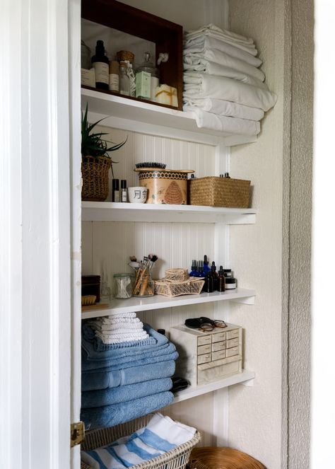 No Bathroom Storage Solutions, Bathroom Built In Organization, Vintage Linen Closet, Small Family Bathroom Storage, Vintage Bathroom Organization, Small Bathroom Linen Closet Ideas, Small Powder Room Storage, Vintage Bathroom Shelves, Books In Bathroom